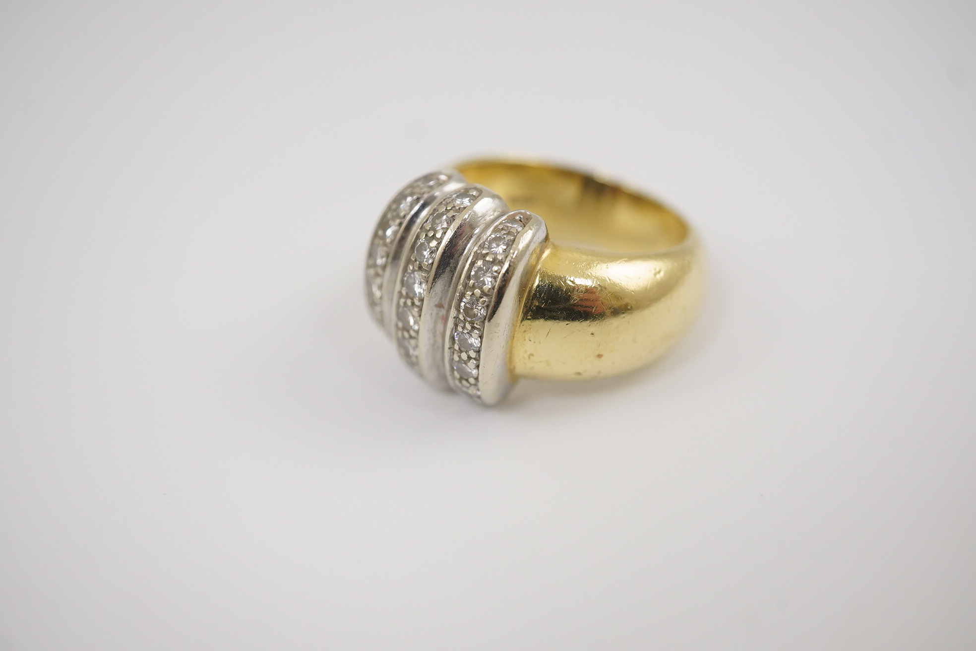 A modern Mappin & Webb Italian 18k gold and three row diamond cluster set dress ring